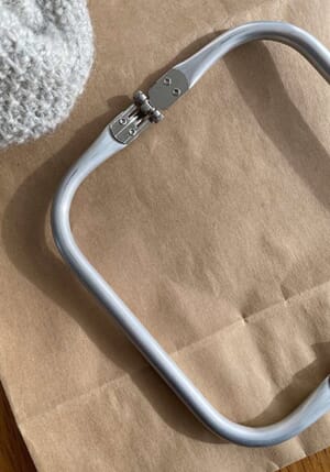 Ramme (veskelås) til liten clutch